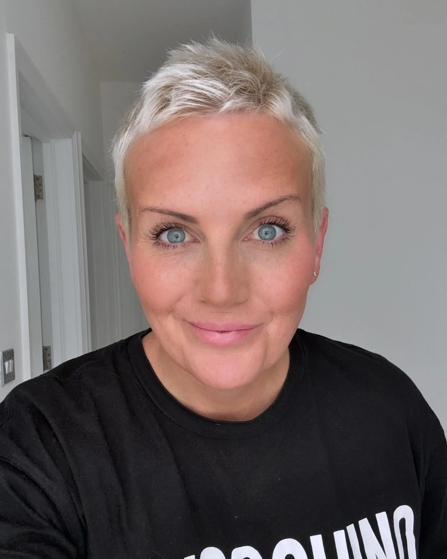 Choppy bleach blonde pixie with piecey definition