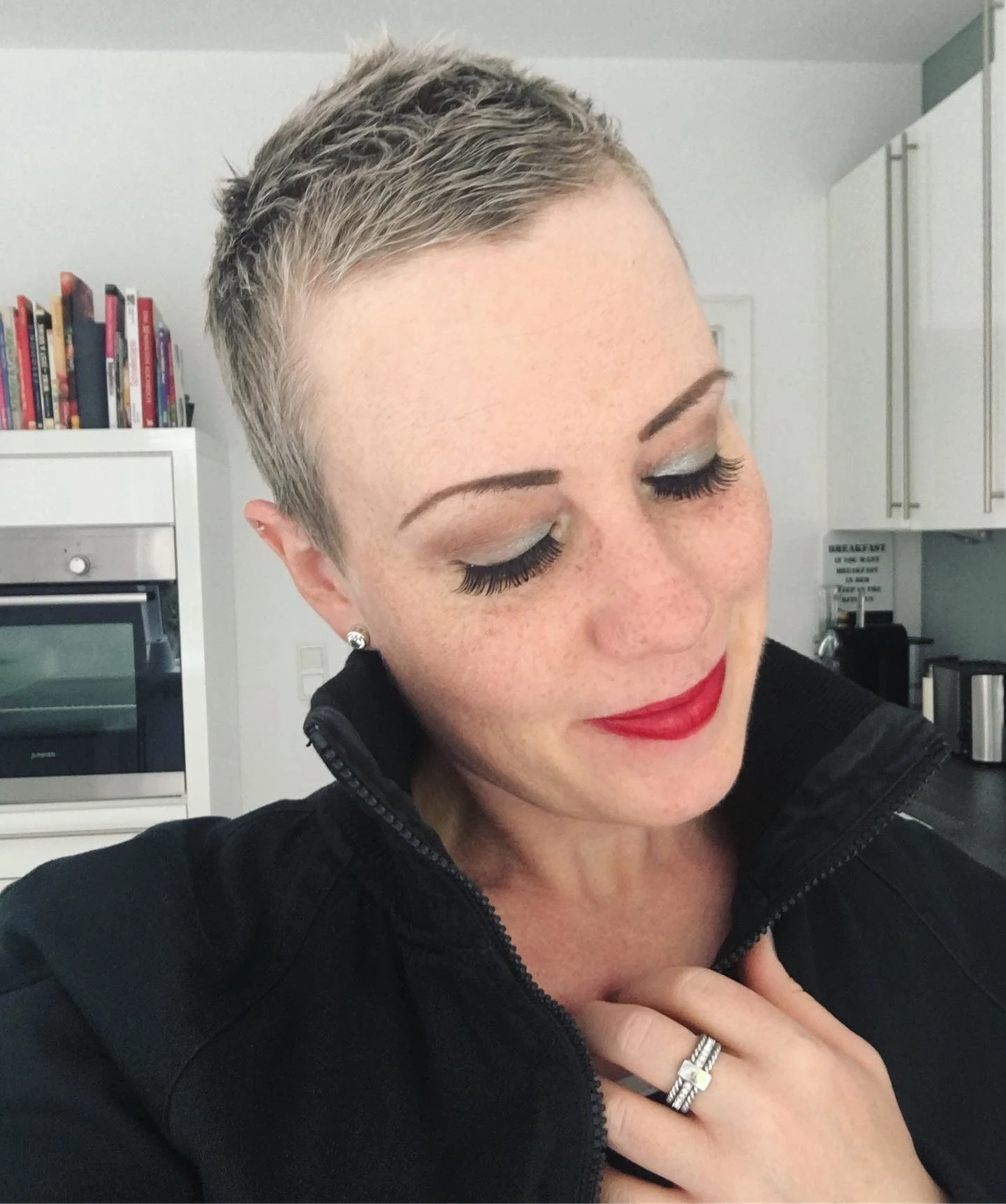 Soft textured buzz pixie with salt and pepper tones