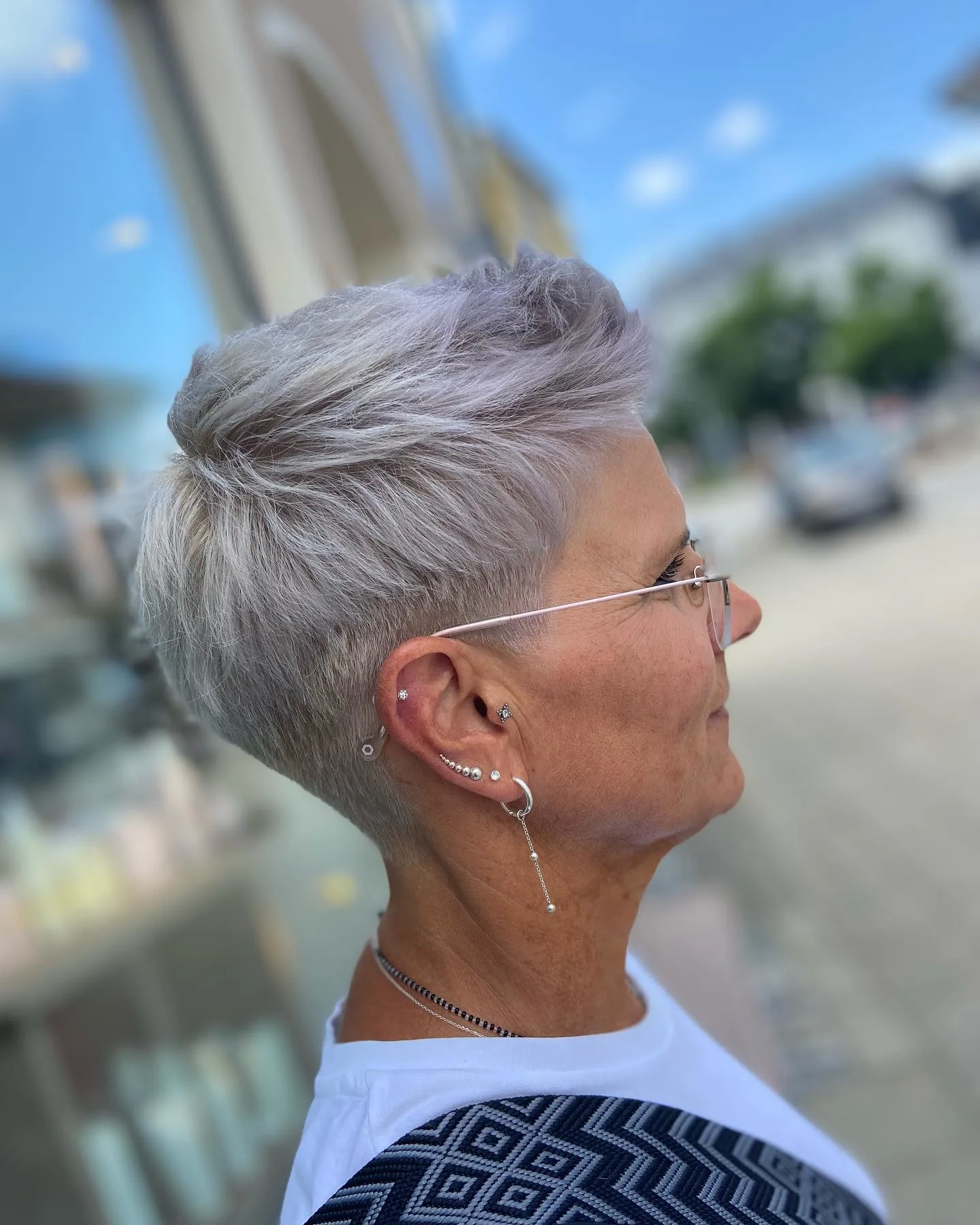 Textured silver pixie with faded sides side profile view