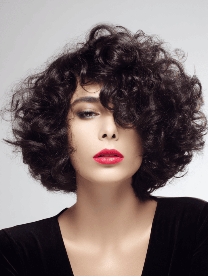 22 Cute Layered Bob Haircuts for Curly Hair That Add Shape and Bounce